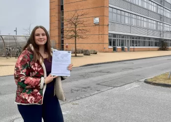 Joanna in front of Europa-Universität Flensburg.