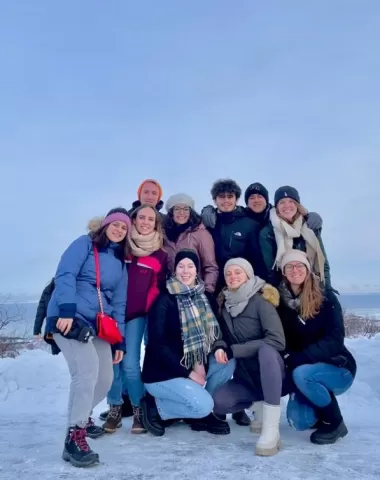 A group of Sana's friends, posing outside