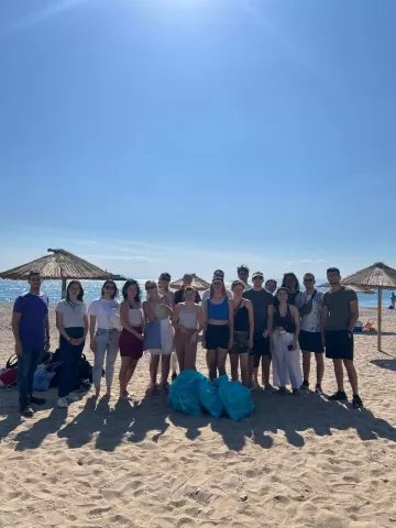 group of volunteers and eramsus after a beach cleaning